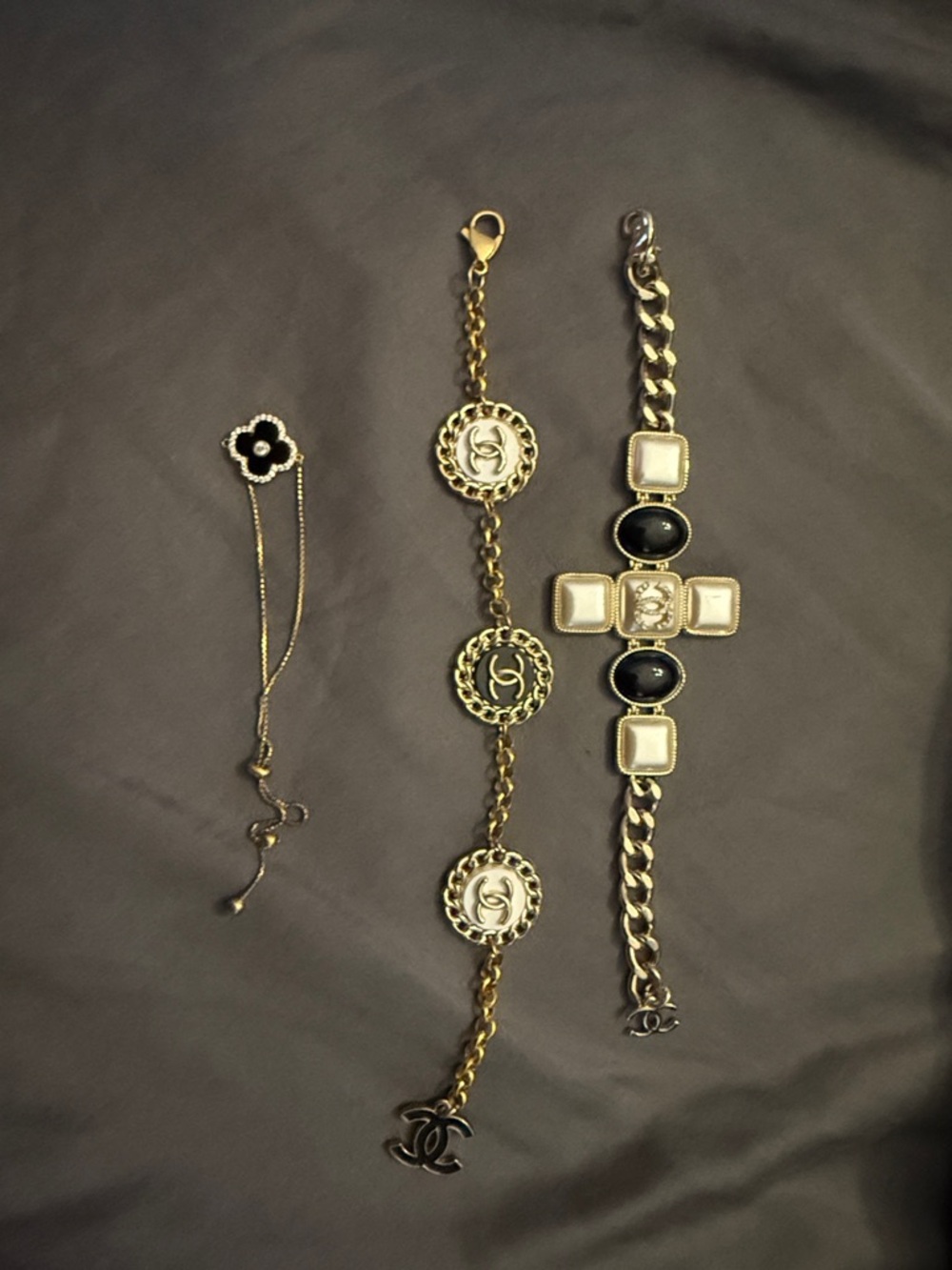 Designer Inspired Gold Tone Bracelet Trio with Black and Cream Accents